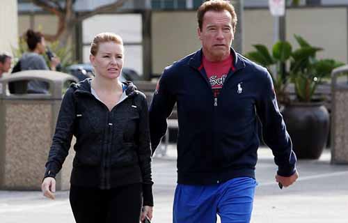 Arnold Schwarzenegger with Heather Milligan