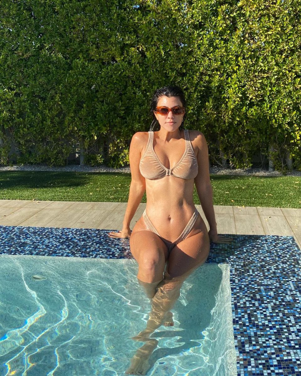 Kourtney Kardashian Puts Her Signature Kardashian Curves On Display In
